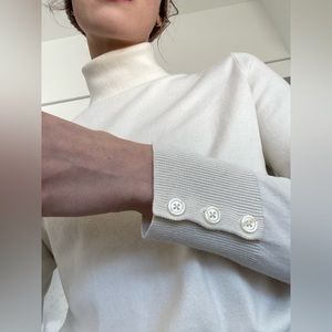 Cream turtleneck vintage button detail